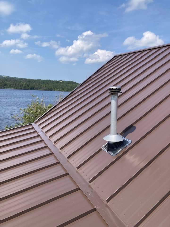 Brown steel roof with roof vent installed by Freedom Metal Roofing NL
